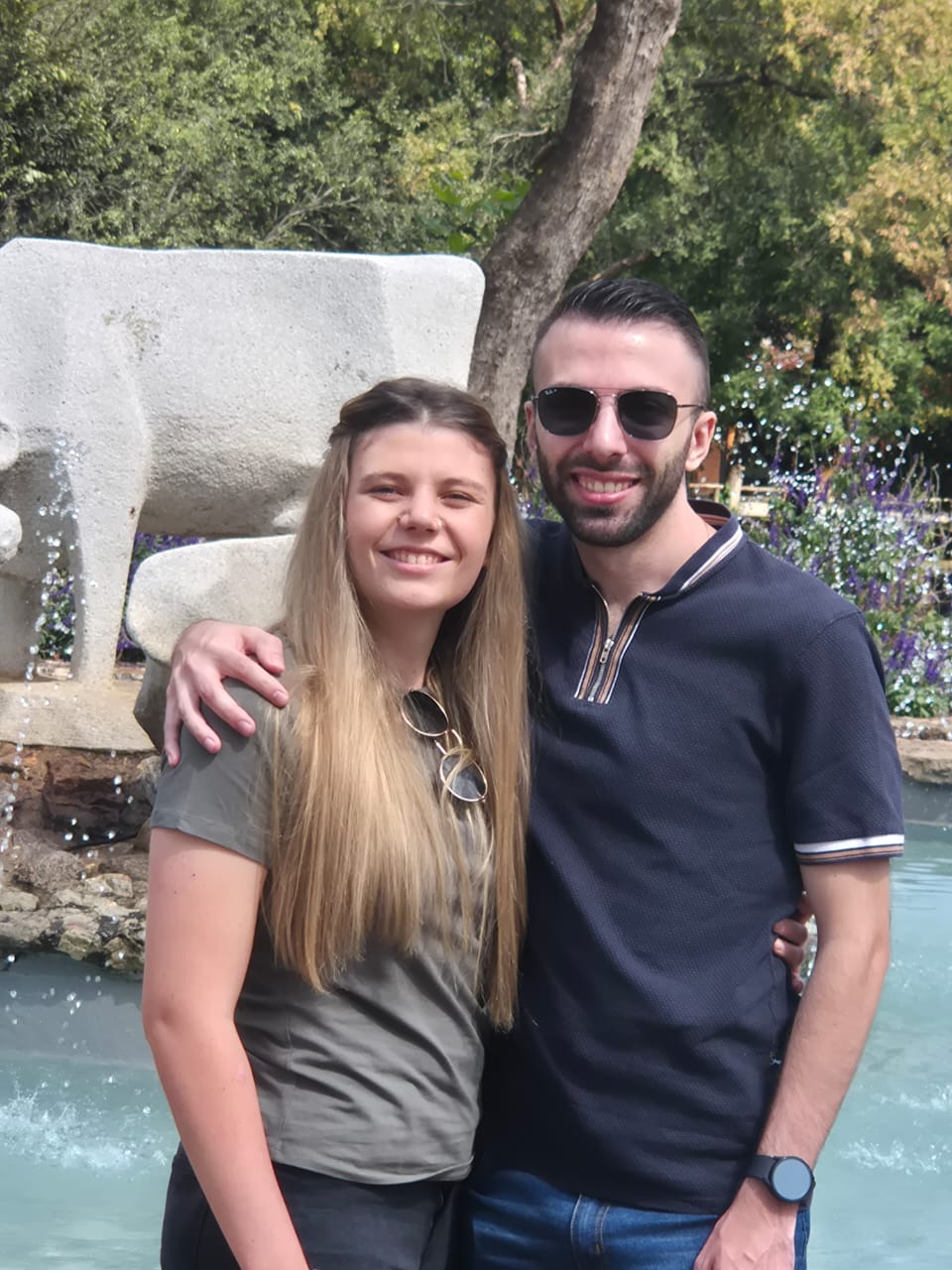 Rui and Cailyn together by a fountain